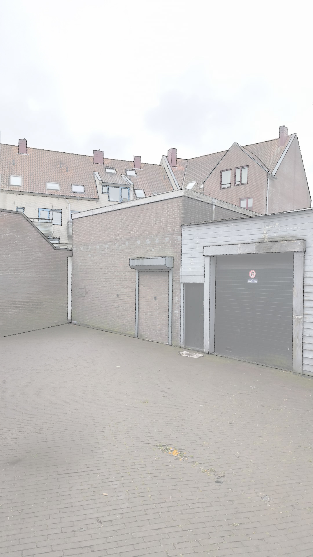 Bestaande achtergevel van de autowerkplaats aan Raam in Schiedam